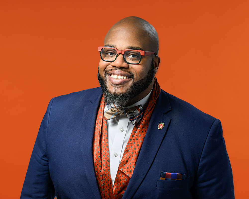 LaVar-Orange-backdrop Photo of Brooke Adams